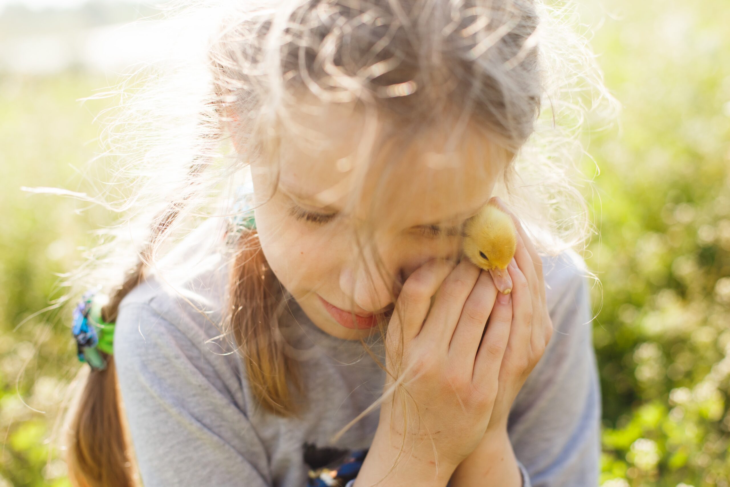 Vegan child with duckling. Photo by Yulia Dubyn.jpg